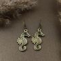 Earrings - sea horses - old gold